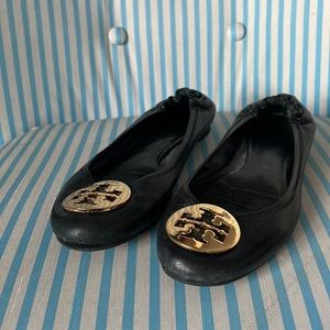 Tory Burch black flats with gold medallion 8M